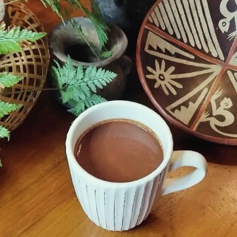 A finished cup of ceremonial cacao
